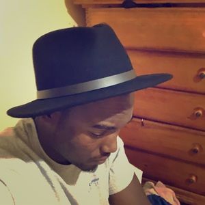 Fedora medium to wide brim hat